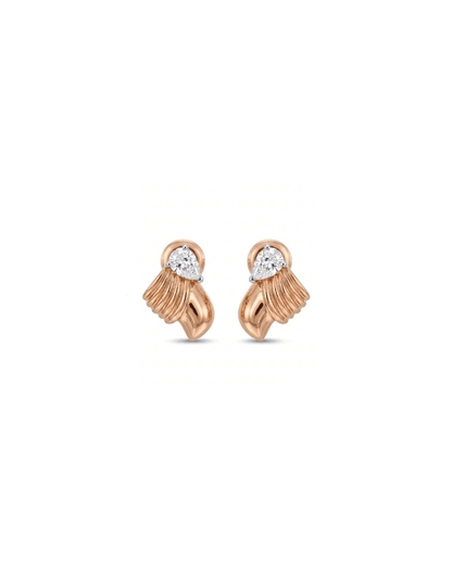 A pair of rose gold earrings with a textured, ribbed leaf-like design and a small pear-cut clear gemstone at the top, set against a plain white background.